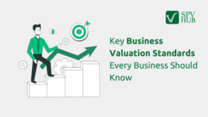 Illustration of a business professional standing on a bar chart with an upward arrow and target icon, representing key business valuation standards every business should know.